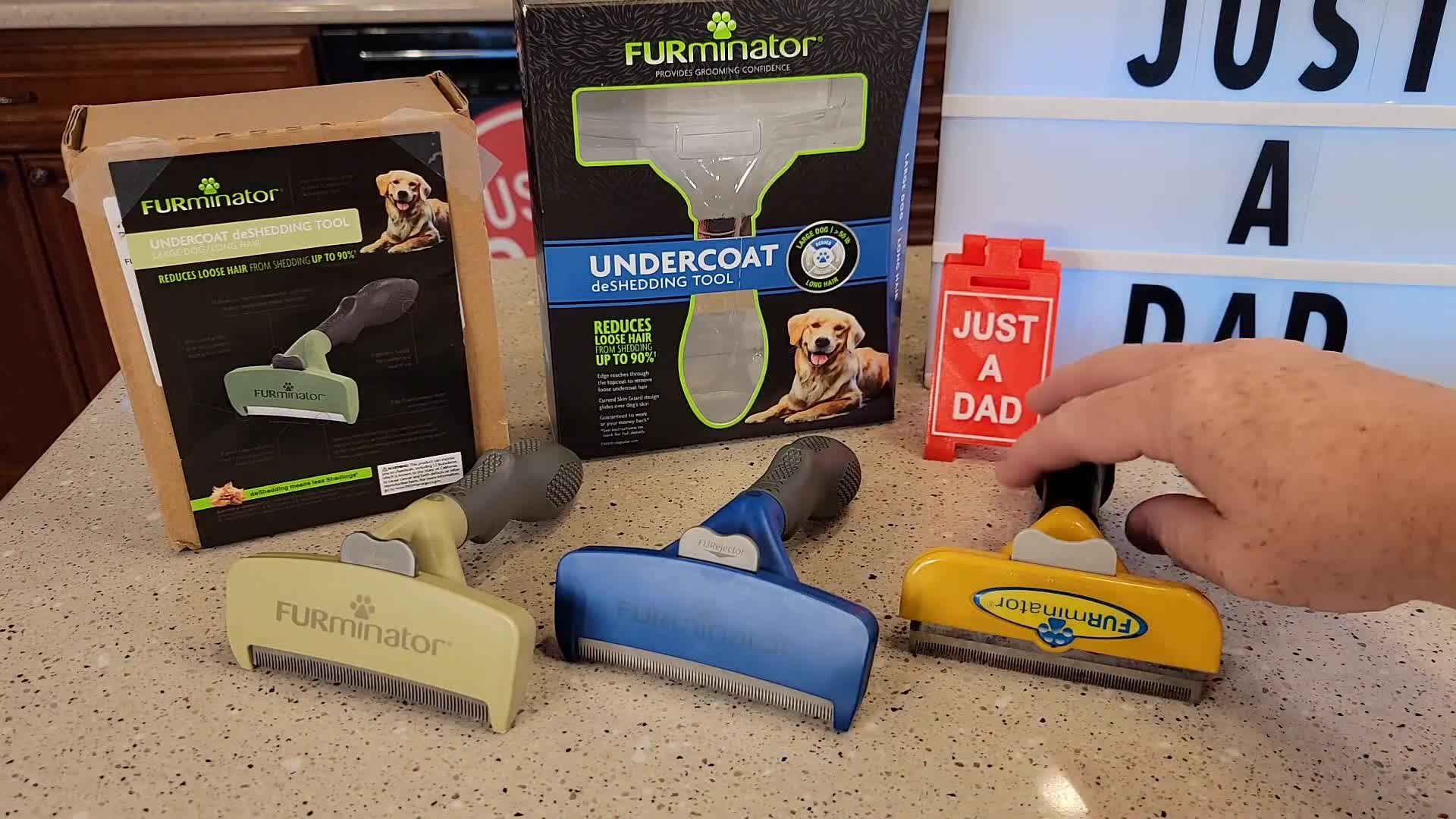 Close-up of the black FURminator de-shedding tool