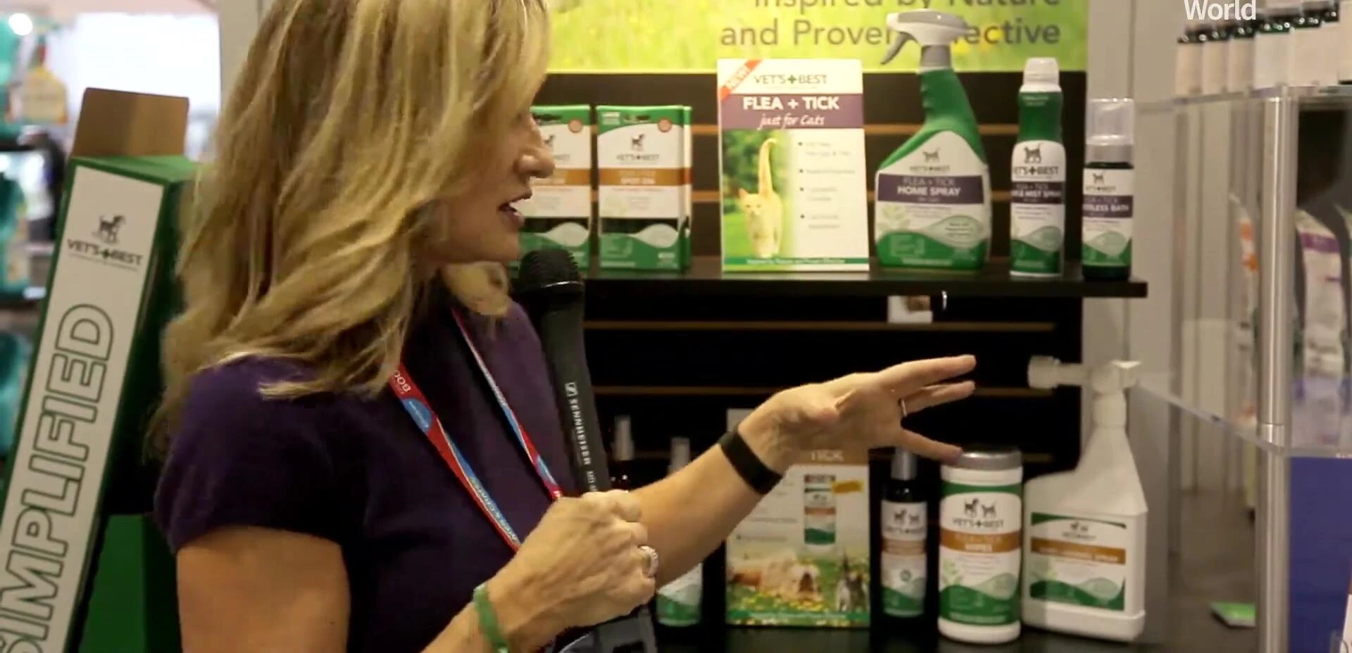 Person showing various Vet's Best products for cats.