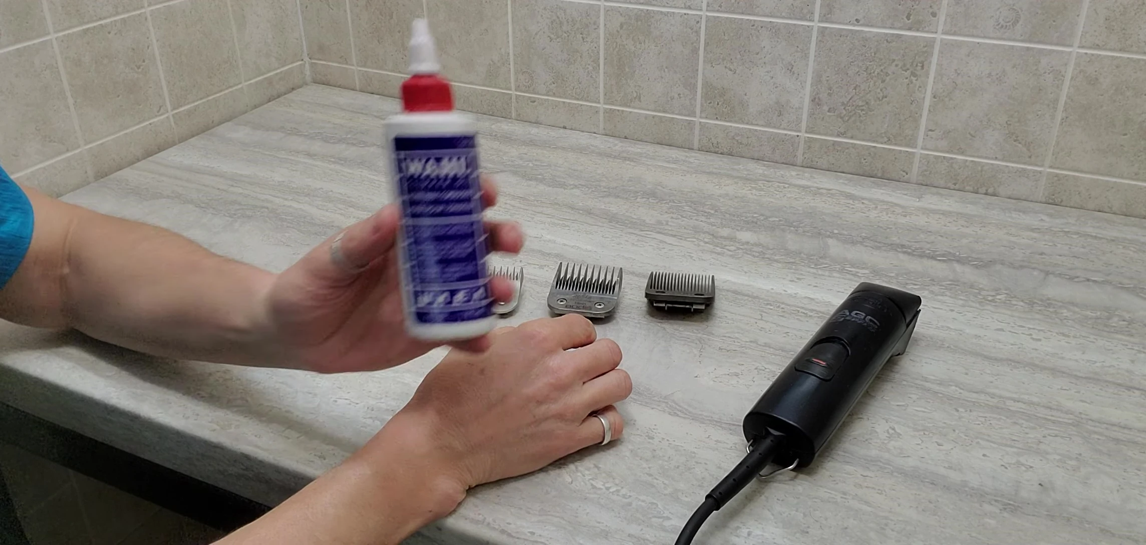 A bottle of clipper oil is shown.