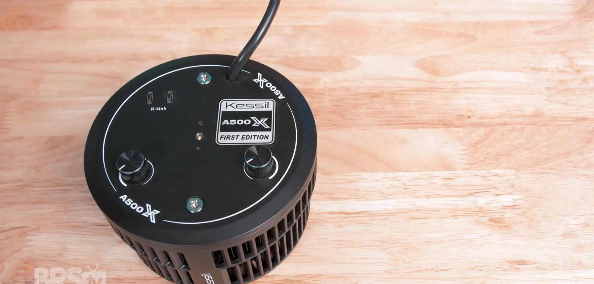 Close-up of the Kessil A500X showing its compact size