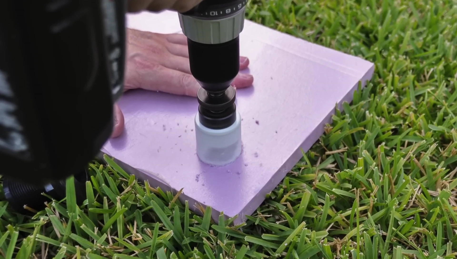 Jig in use to hold drill bit