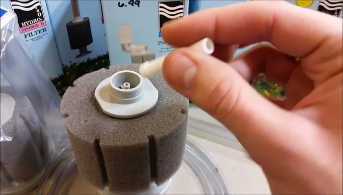 Optional: Add filter media (e.g., Purigen, carbon) to the space between the male and female strainers.