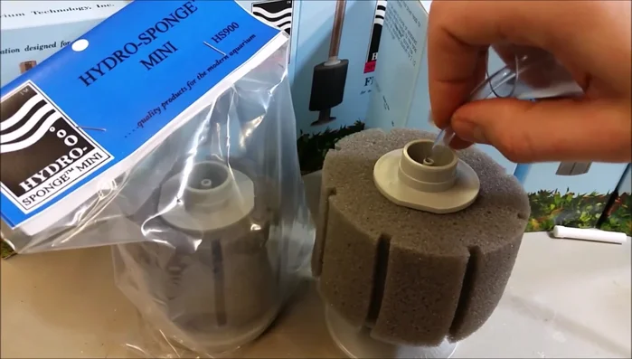 Optional: Add filter media (e.g., Purigen, carbon) to the space between the male and female strainers.