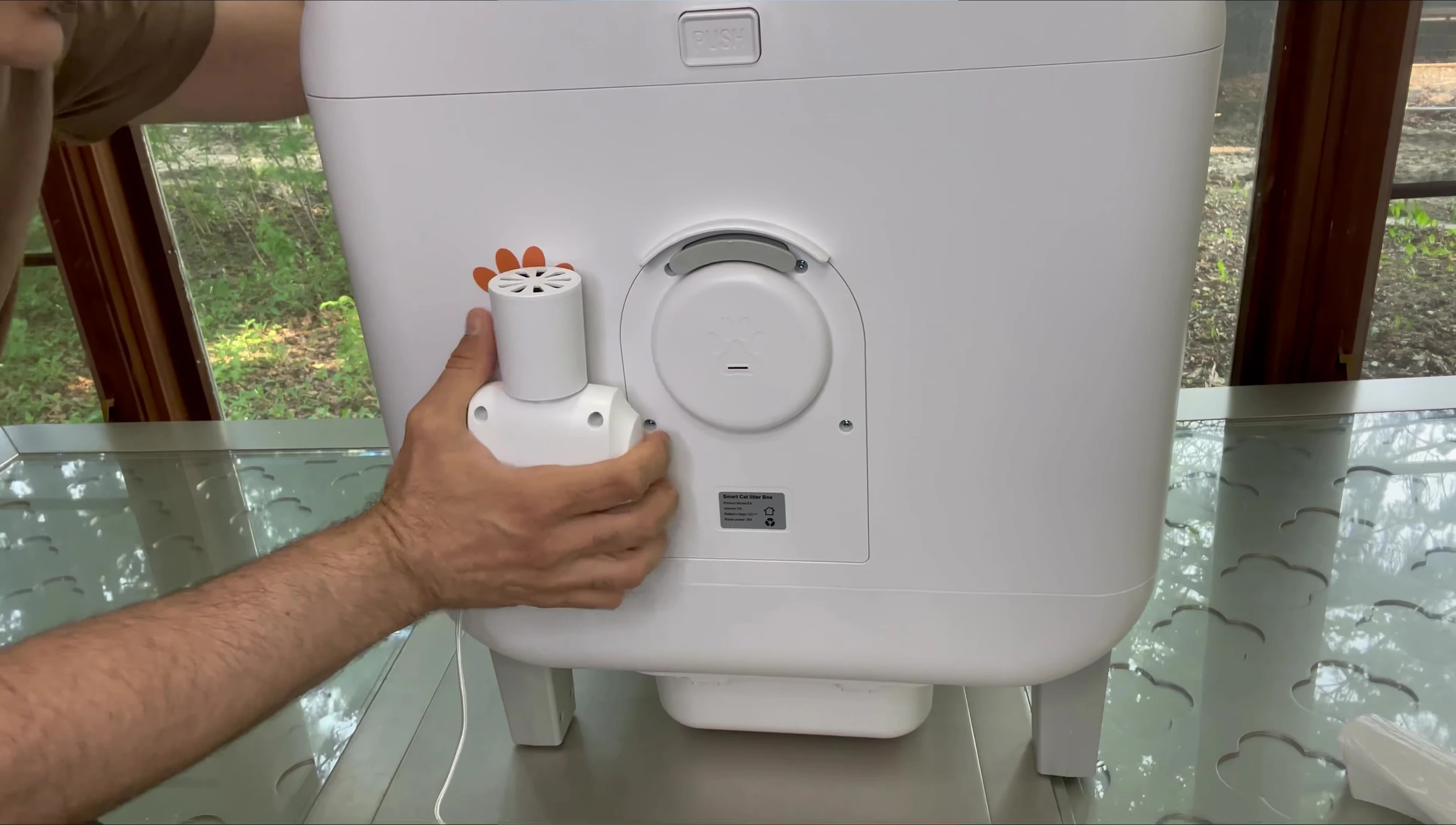 Image depicting the UV sterilization feature and deodorizer holder.