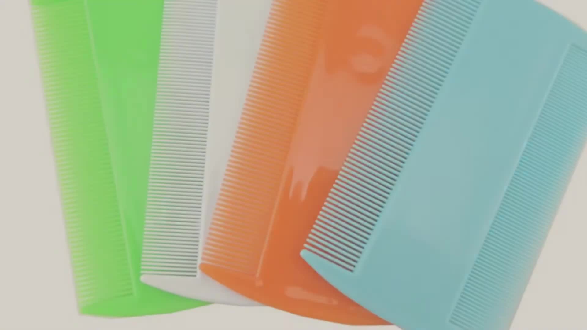 Close-up shot of a cat flea comb