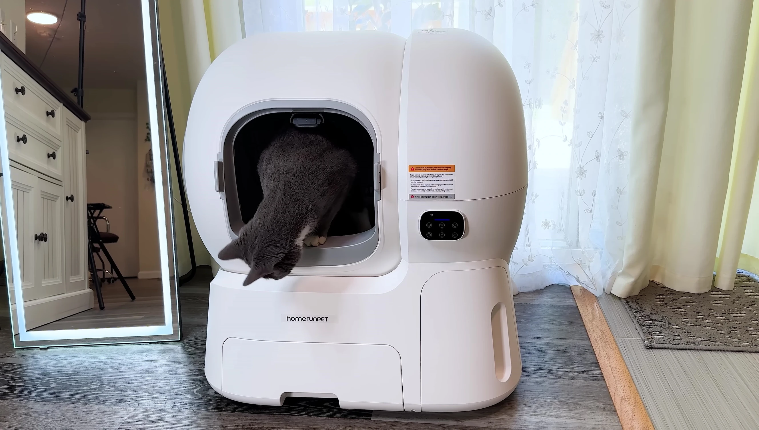 Overall shot of the litter box, showcasing its size and design.