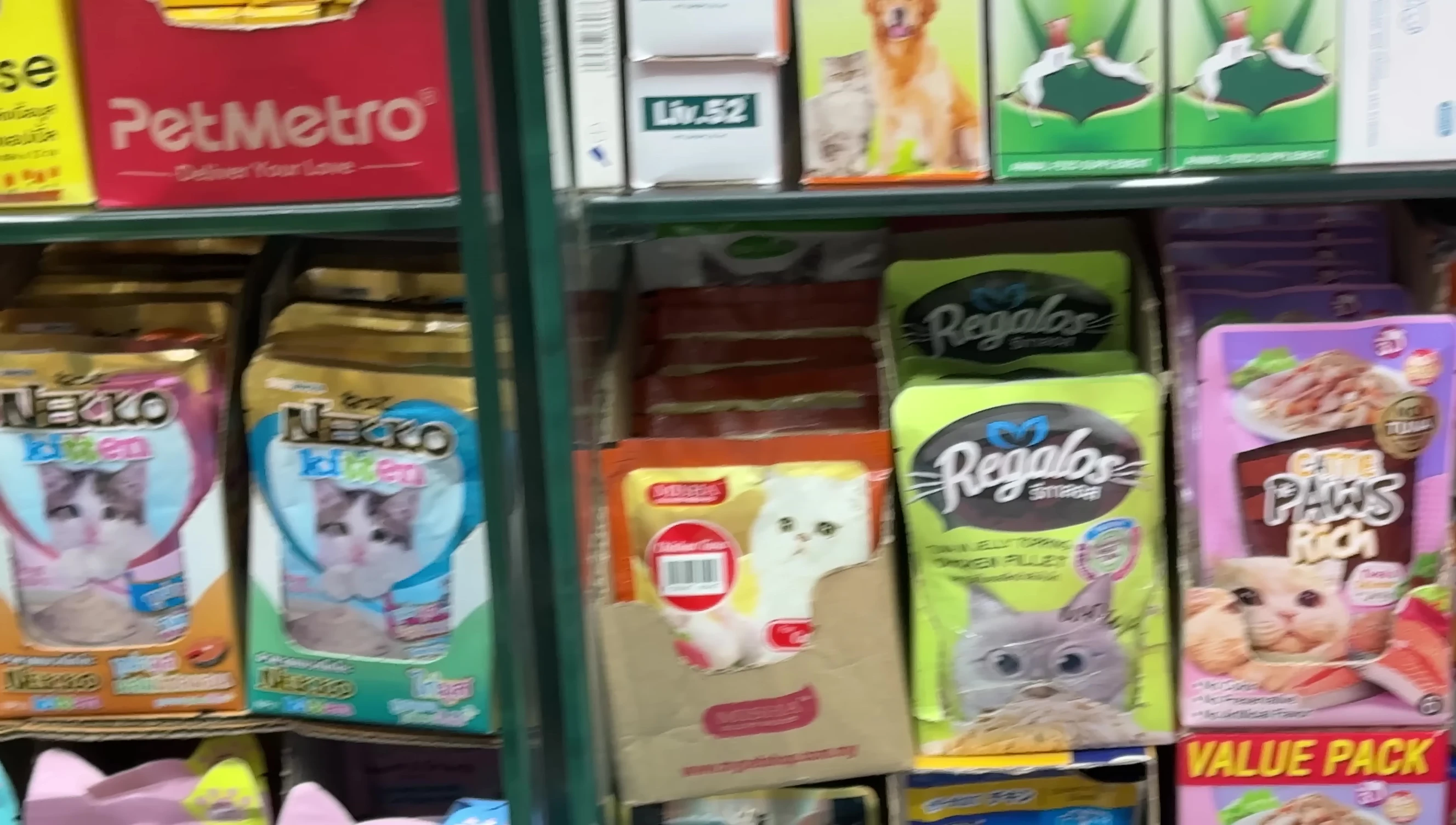 Variety of pet food pouches.