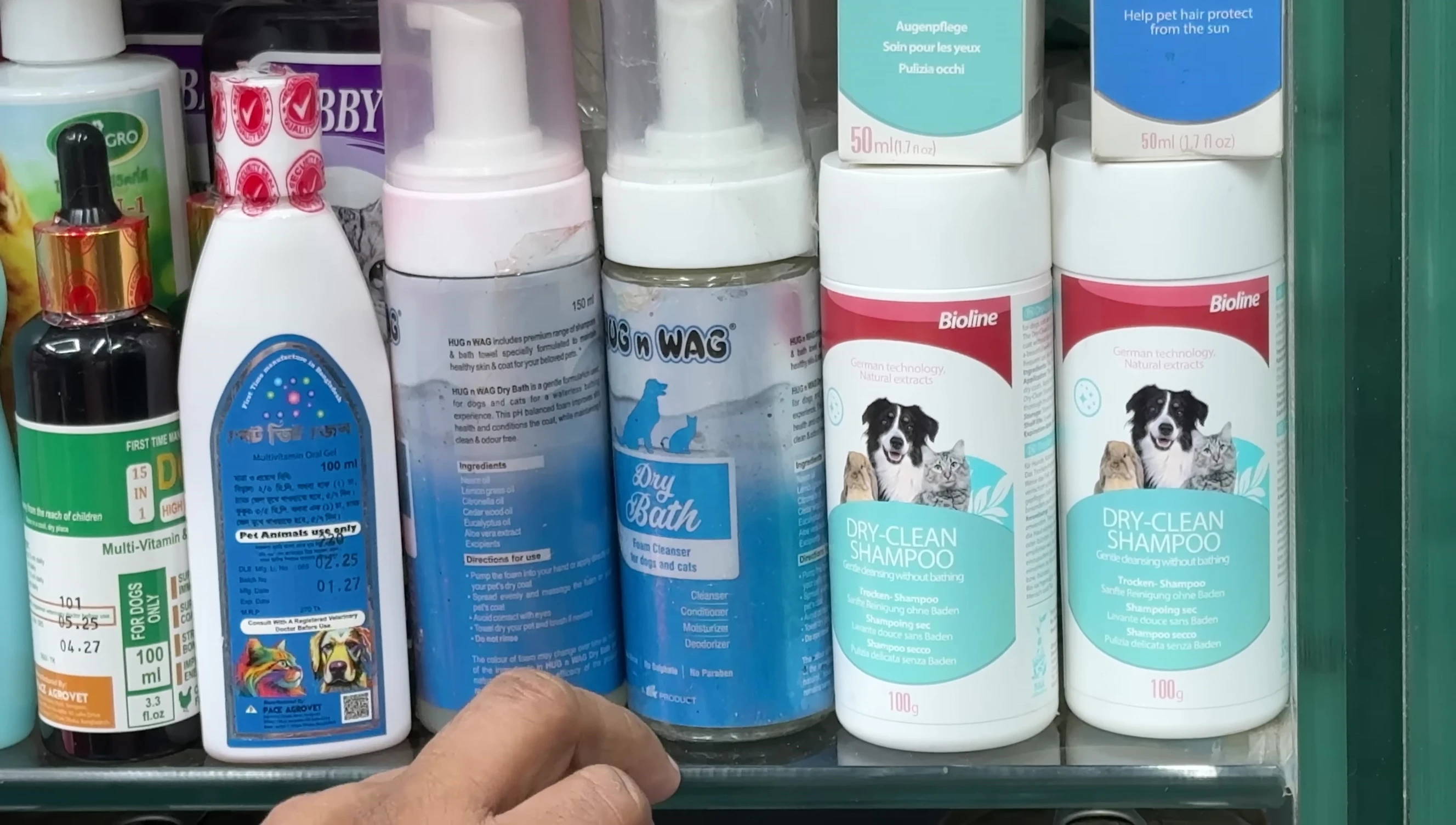 Close-up of Derai shampoo and Cocot Cocot vitamins.