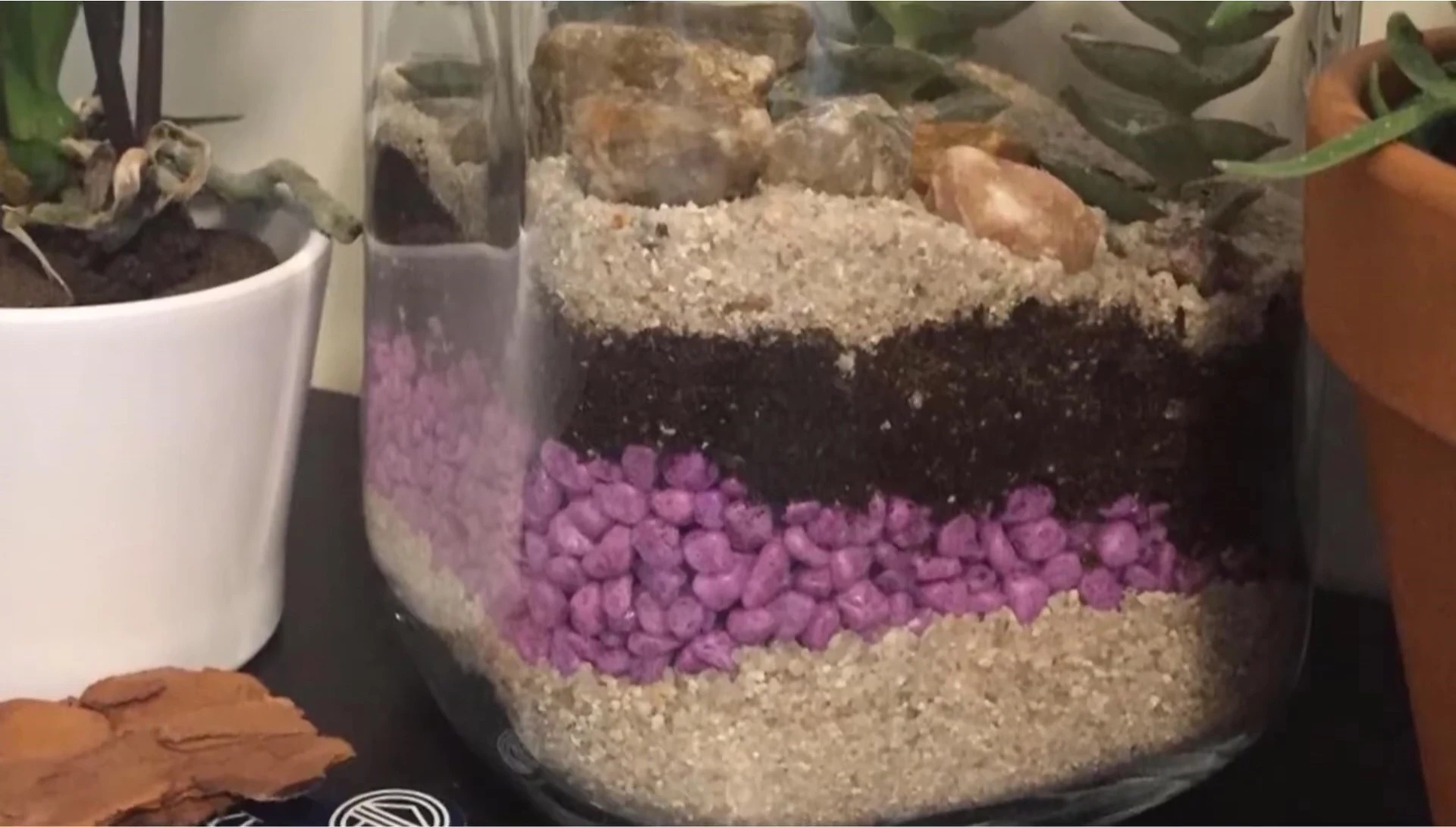 Marina gravel in an aquarium showing color variety
